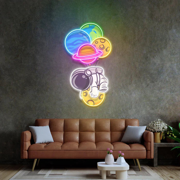 Astronaut Hugging Planet UV Art Led Neon sign shines brightly, adding flair to any room. Get yours at manhattanneons.com