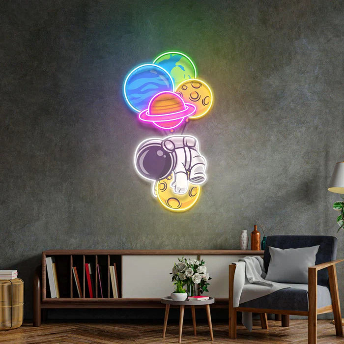 Astronaut Hugging Planet UV Art Led Neon sign shines brightly, adding flair to any room. Get yours at manhattanneons.com