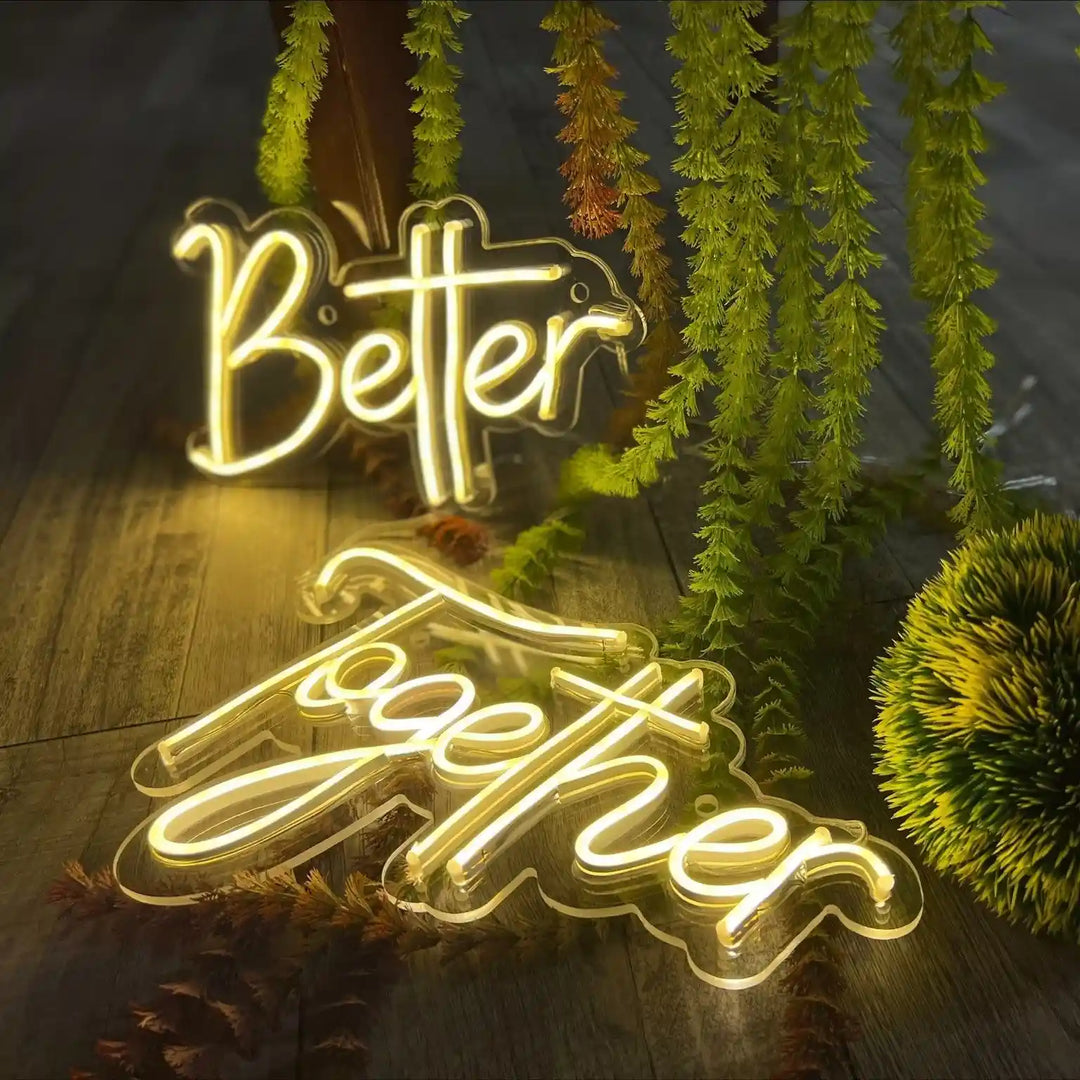 Better Together Neon Sign - shimmering neon lights glow in the night sky, symbolizing unity and love - from manhattonneons.com.