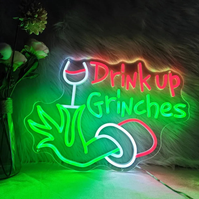 Drink Up Christmas Neon Sign by manhattanneons.com - Add a festive, playful touch to your décor with this drink up neon sign for the holidays.