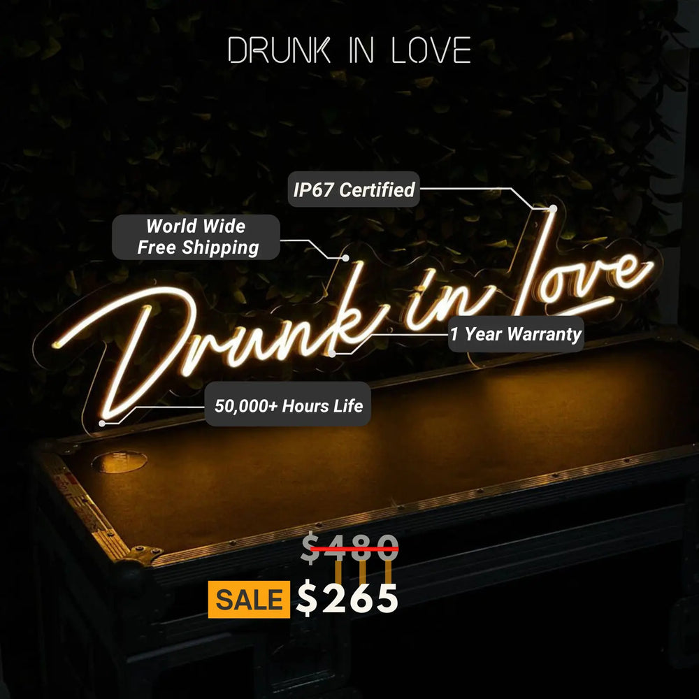 the Drunk In Love wedding neon sign from ManhattanNeons.com looks great in the dark, adding a romantic glow to your celebration.