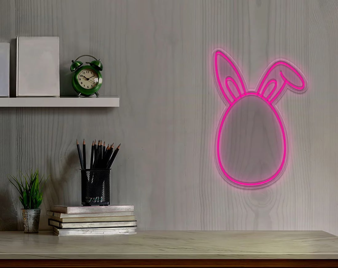 Bunny Egg Head Easter Neon Sign by manhattanneons.com – A fun Easter bunny neon with an egg-shaped head.