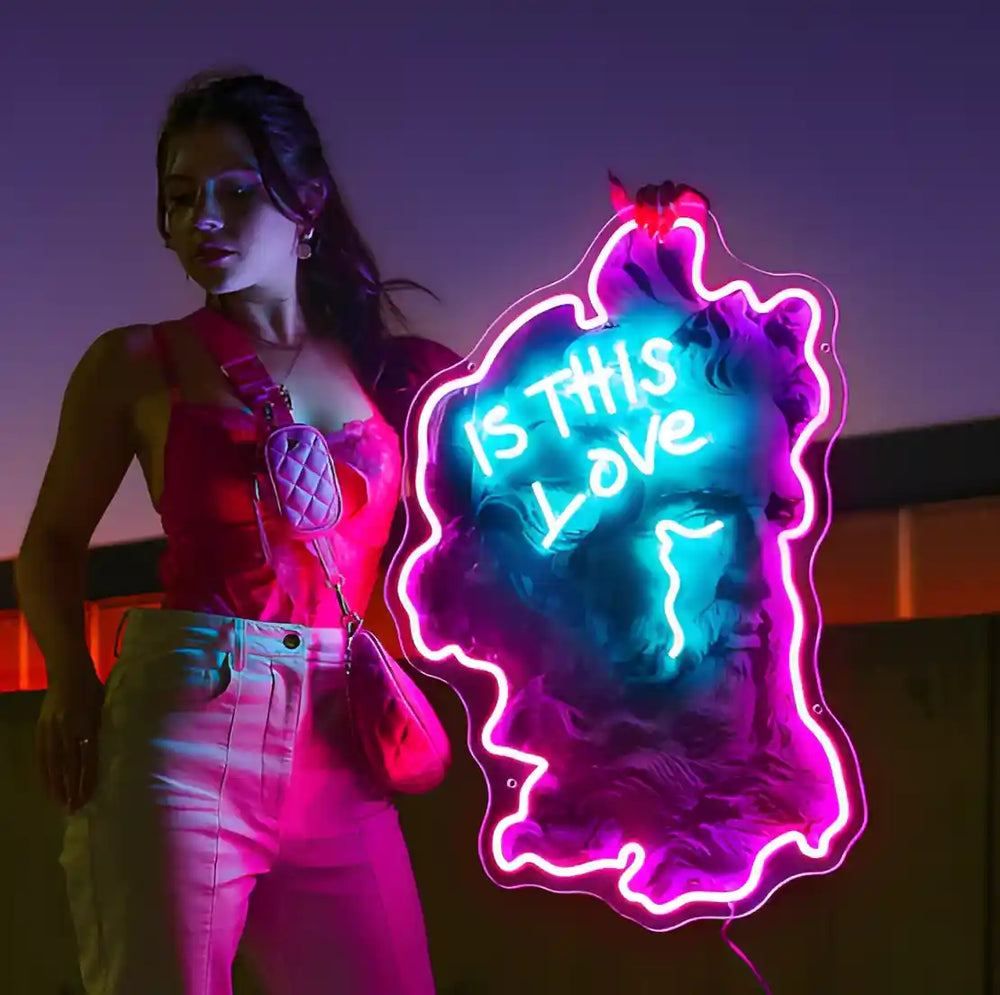 IS THIS LOVE UV ART LED NEON SIGN, bringing a burst of color and style to your space - from manhattanneons.com.