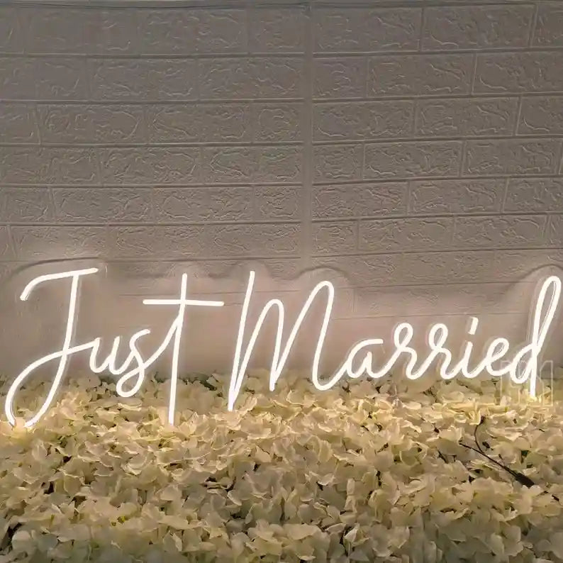 Capture the joy of new beginnings with the Just Married wedding neon sign from ManhattanNeons.com, radiating love and celebration.