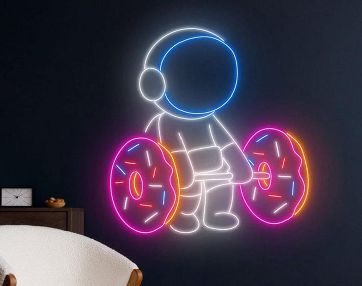 Lifting Donut LED Neon Sign by manhattanneons.com - Sweet strength glowing in neon.
