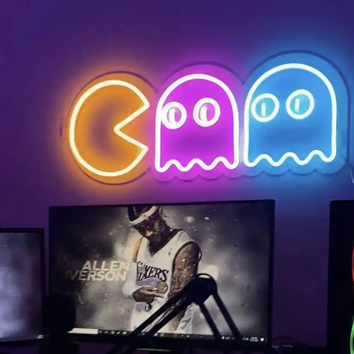 Pac-Man Chasing Ghosts Neon Sign | Bring Retro Gaming Fun to Life - Illuminated Arcade Nostalgia from manhattonneons.com