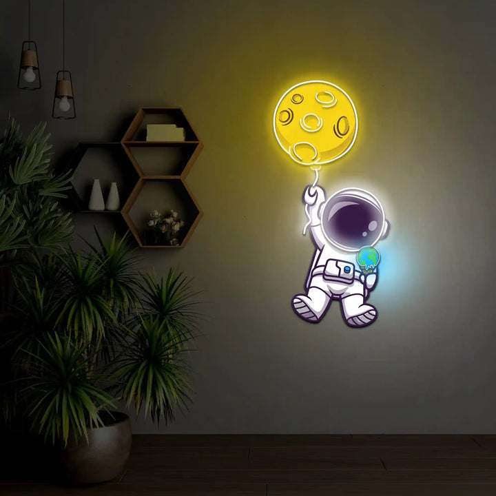 Planet Balloon with UV Light - Vibrant Celestial Glow - Illuminate Your Space - from manhattonneons.com.