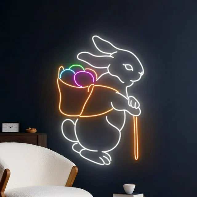 Rabbit Picking Eggs Easter Neon Sign by manhattanneons.com – A playful Easter bunny neon sign.