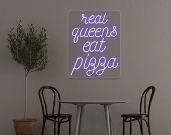 Real Queens Eat Pizza LED Neon Sign by manhattanneons.com - Bold neon for pizza lovers.