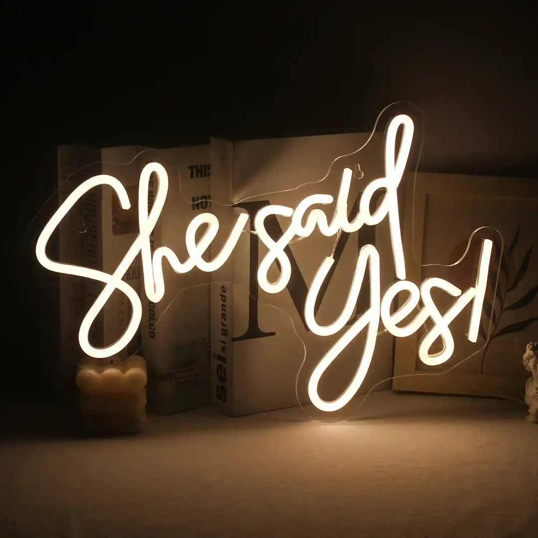 Celebrate the moment with the She Said Yes wedding neon sign from ManhattanNeons.com, lighting up your joy.