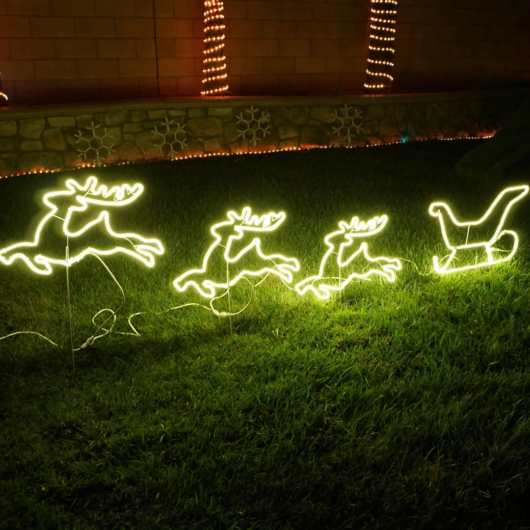 Three Reindeer and Sleigh Neon Sign by manhattanneons.com - Bring holiday cheer to your space with this festive reindeer and sleigh neon sign.