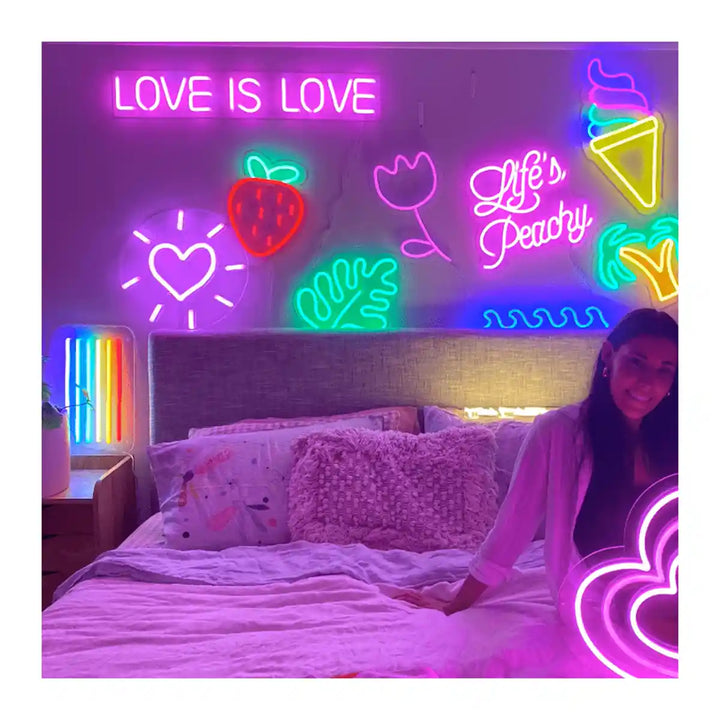 Love Is Love Wedding Neon Sign glowing in vibrant colors, spreading joy and inclusivity - from manhattonneons.com