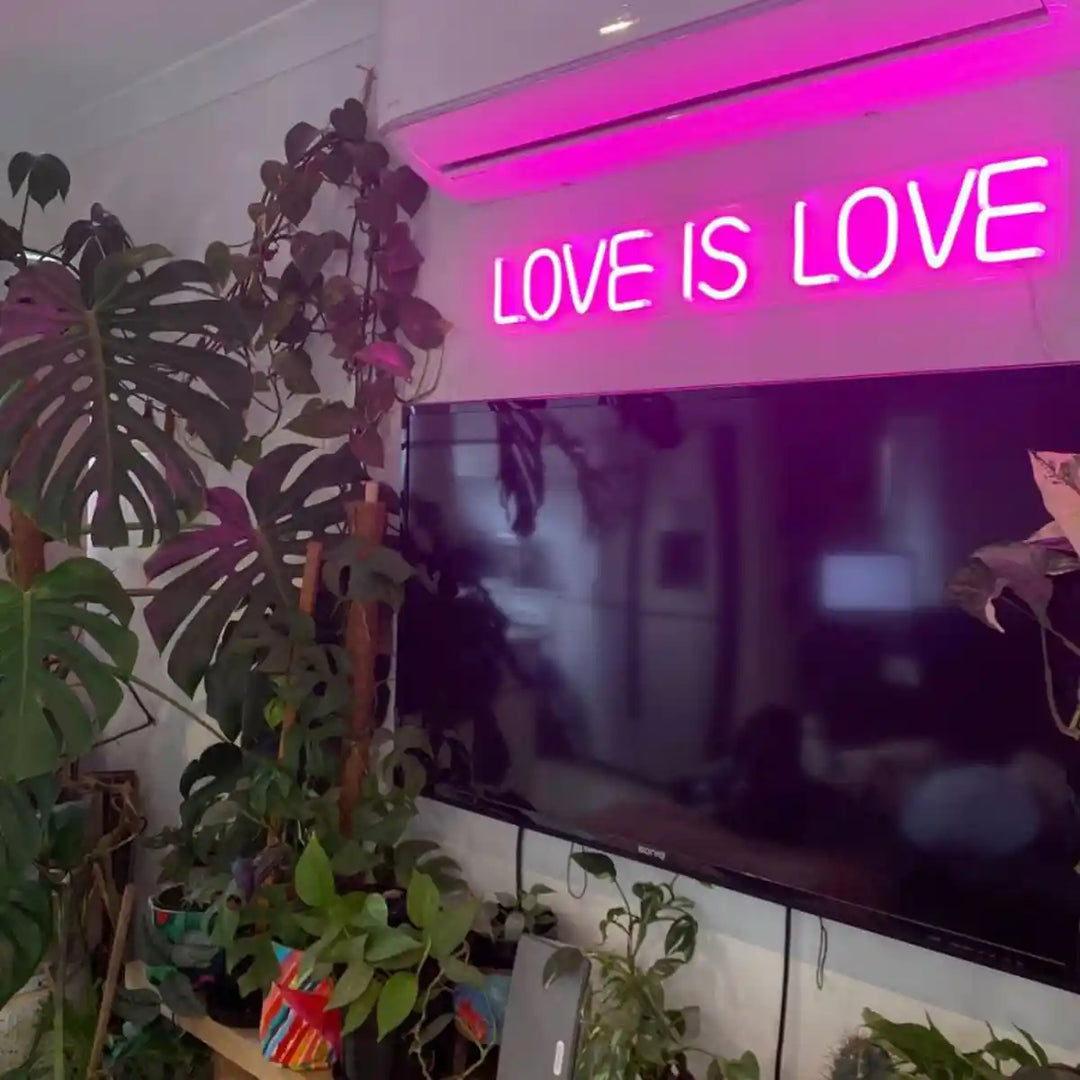 Love Is Love Wedding Neon Sign glowing in vibrant colors, spreading joy and inclusivity - from manhattonneons.com