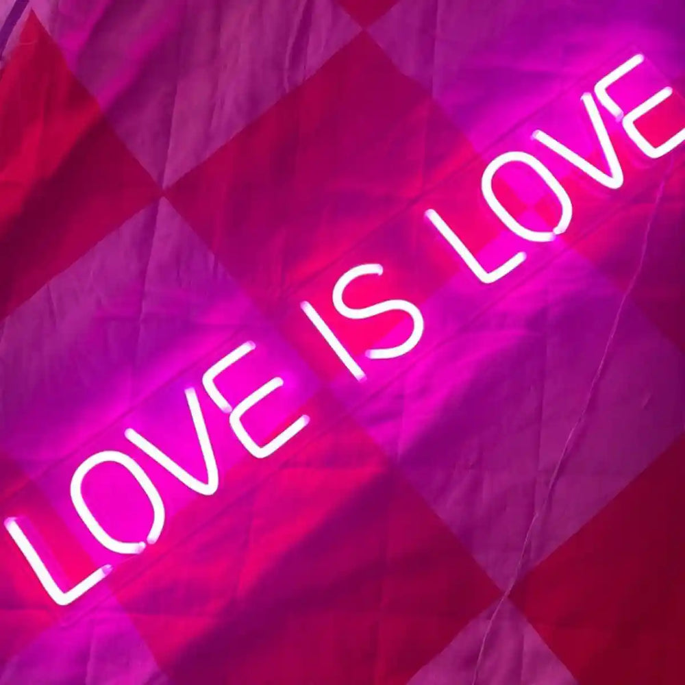 Love Is Love Wedding Neon Sign glowing in vibrant colors, spreading joy and inclusivity - from manhattonneons.com