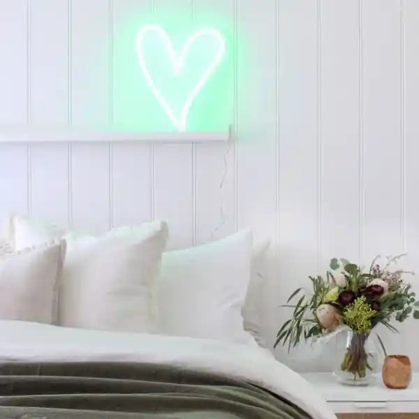 Love Neon Heart Wedding Neon Sign: A vibrant red heart-shaped neon sign glowing with love and passion, perfect for wedding celebrations. - from manhattonneons.com 