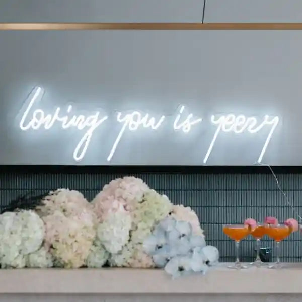 Loving You Is Yeezy Wedding Neon Sign - A vibrant and stylish neon sign illuminating the night with love and modern elegance - from manhattonneons.com 