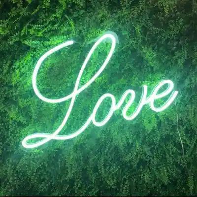 Modern Love Wedding Neon Sign glowing brightly in the night, symbolizing eternal love - from manhattonneons.com