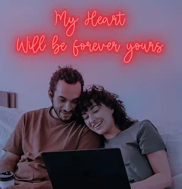 My Heart Will Be Forever Yours glowing brightly in neon lights, a romantic and captivating sign. - from manhattonneons.com