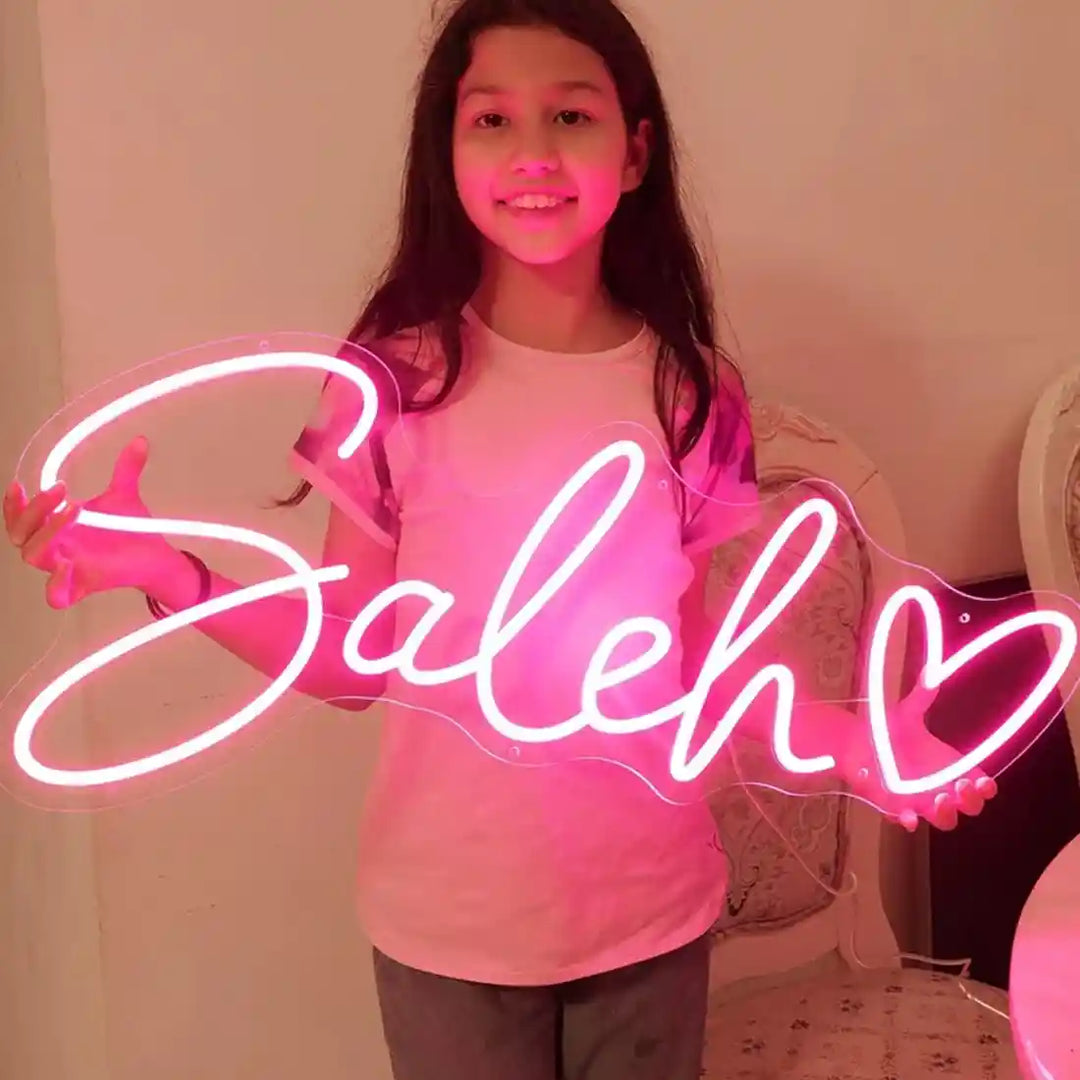 Saleh Name Neon Sign, adding a personalized glow to your space - from manhattonneons.com.