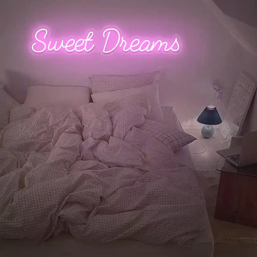 Sweet Dreams Name Neon Sign, casting a warm glow for a cozy night - from manhattonneons.com.