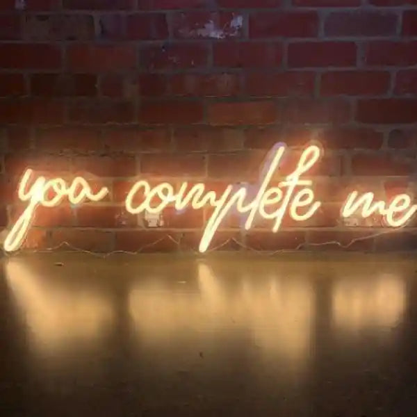 You Complete Me Wedding Neon Sign - A colorful neon sign glowing with love and affection, perfect for adding a touch of romance to any setting - from manhattonneons.com